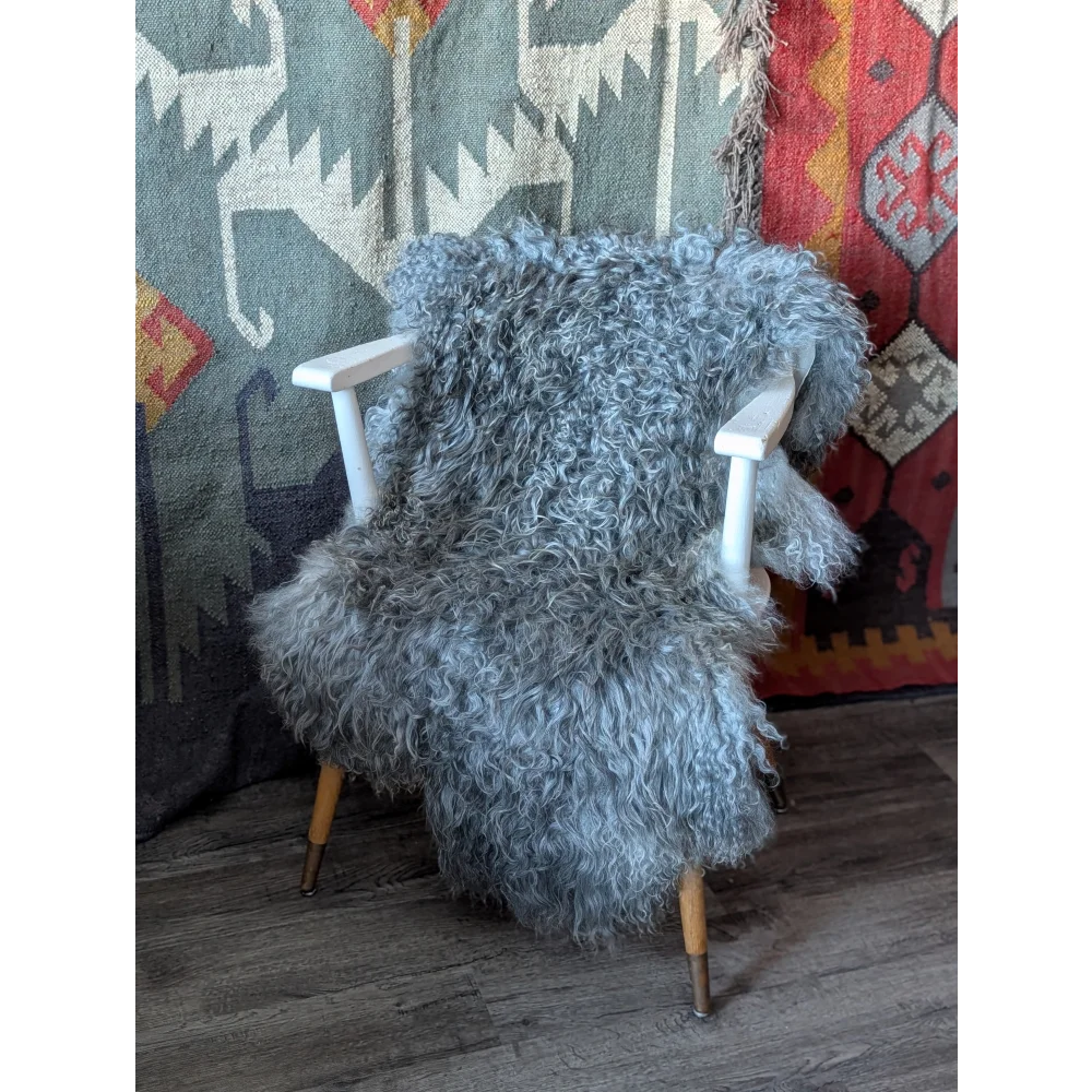 Gotland sheepskin throw 50x29 on white wooden chair