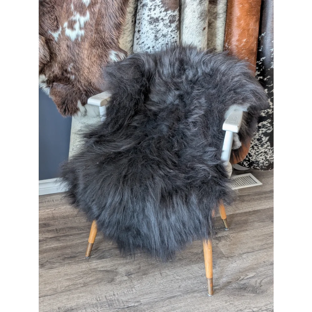Soft Icelandic sheepskin rug on vintage chair, 50x28 inches