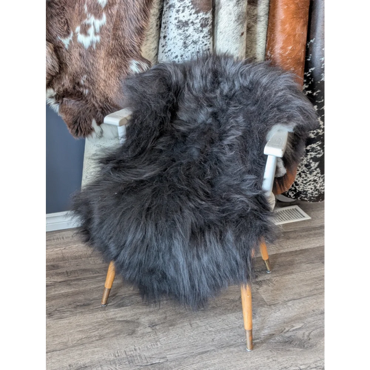 Soft Icelandic sheepskin rug on vintage chair, 50x28 inches