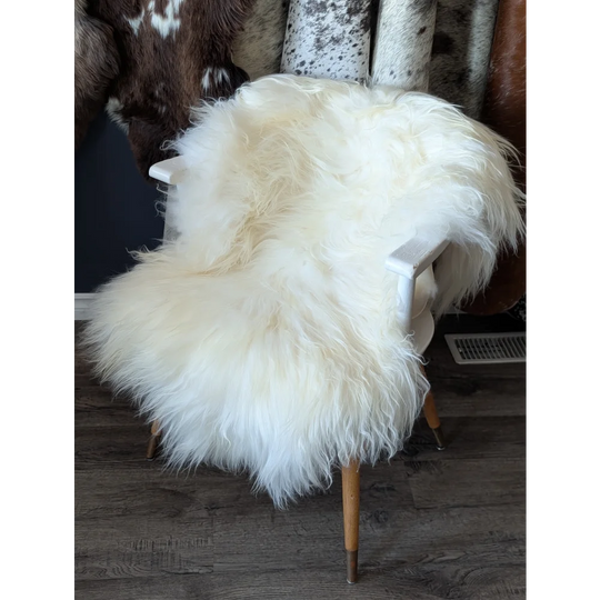 Soft Icelandic sheepskin rug 50x34 inches on vintage chair