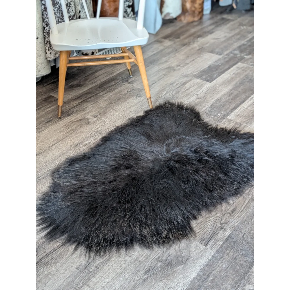 Soft Icelandic sheepskin rug AN52 49x32 fluffy gray plush texture