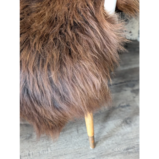 Soft Icelandic sheepskin chair 51x26in brown fluffy with wood legs