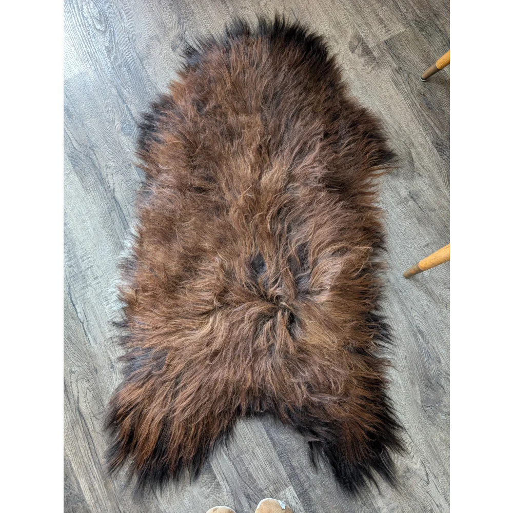 Soft Icelandic sheepskin rug AN66 50x27 plush brown black fur