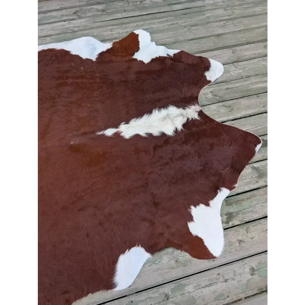 Large 83x77 cowhide rug with brown white patches soft underfoot