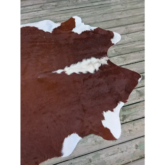 Large 83x77 cowhide rug with brown white patches soft underfoot