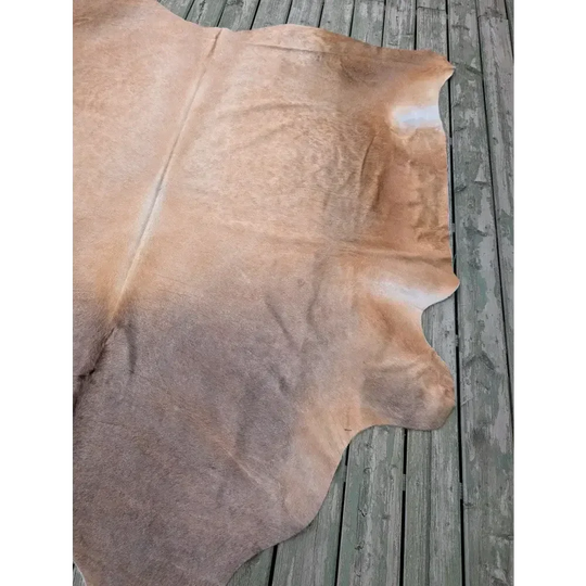 Fabulous extra large cowhide rug in vivid tan and brown hues