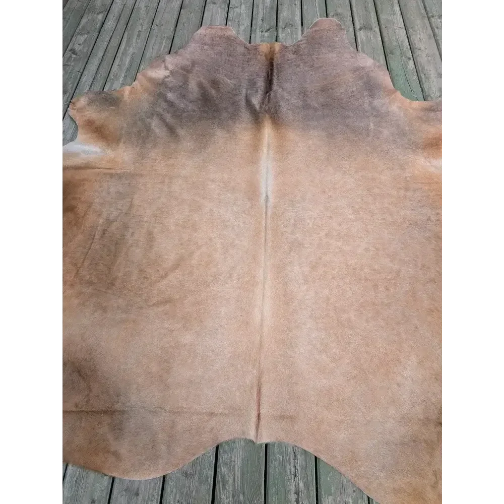 Fabulous extra large cowhide rug in vivid brown and tan hues