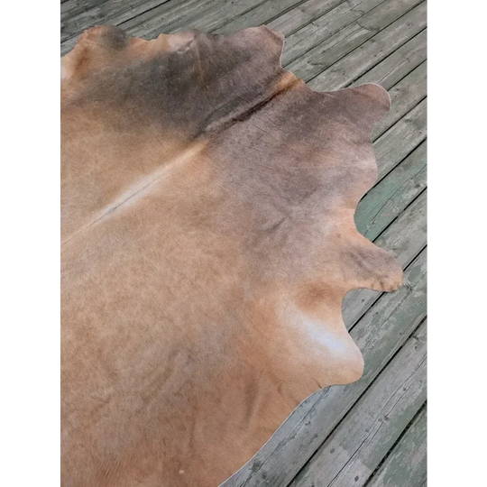Fabulous extra large cowhide rug in vivid tan and brown hues