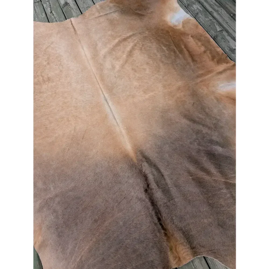 Fabulous extra large cowhide rug in vivid tan and brown hues, soft leather texture