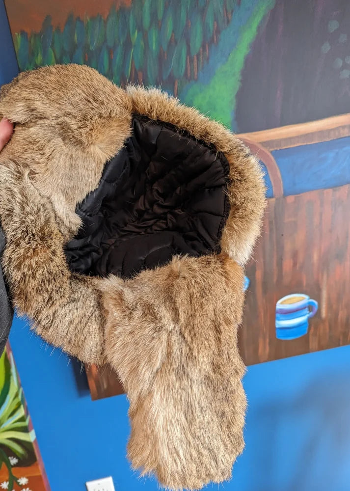 Cozy brown rabbit fur aviator hat with black leather lining and ear flaps