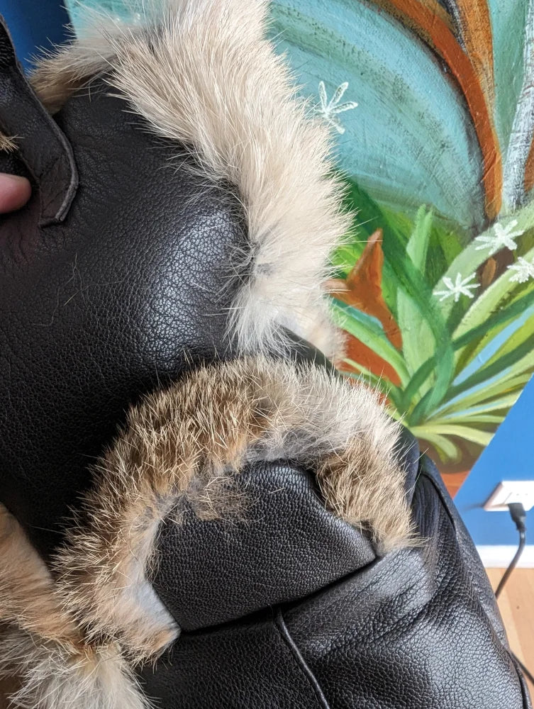Stylish aviator hat made with rabbit fur and black leather jacket trim