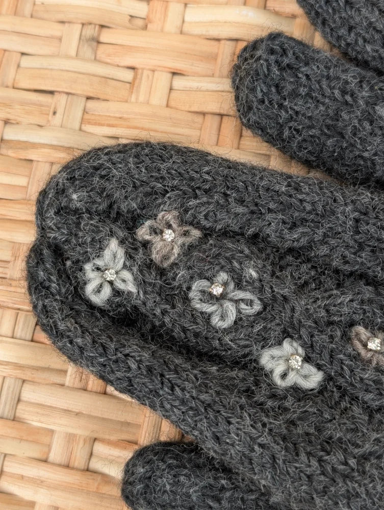 Dark gray azalea mittens with delicate light gray and beige floral embroidery made from cozy zealand wool