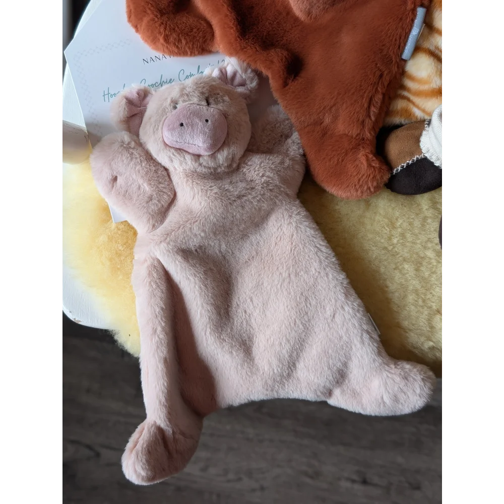 Soft pink pig plush toy from Baby Gift Set with medical sheepskin and dense shearling wool