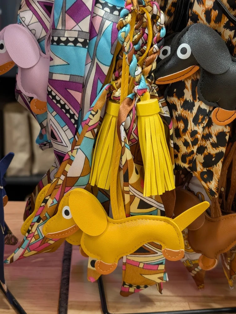 Angus Oliver yellow dachshund bag charm keychain with tassel
