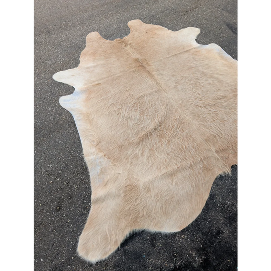 Beige extra large cowhide rug with natural tan and white fur, soft and durable leather