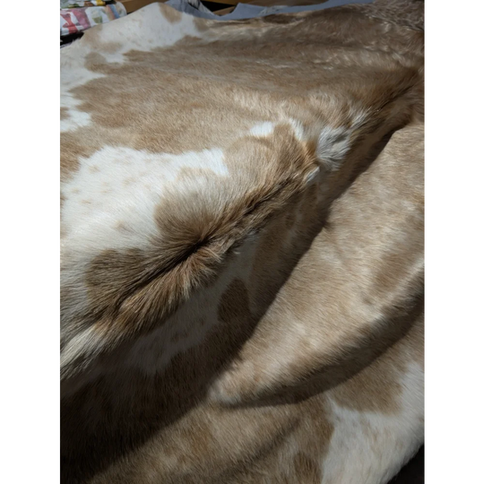 Extra large cowhide blanket in tan white spots, soft natural leather with beautiful rugs aura