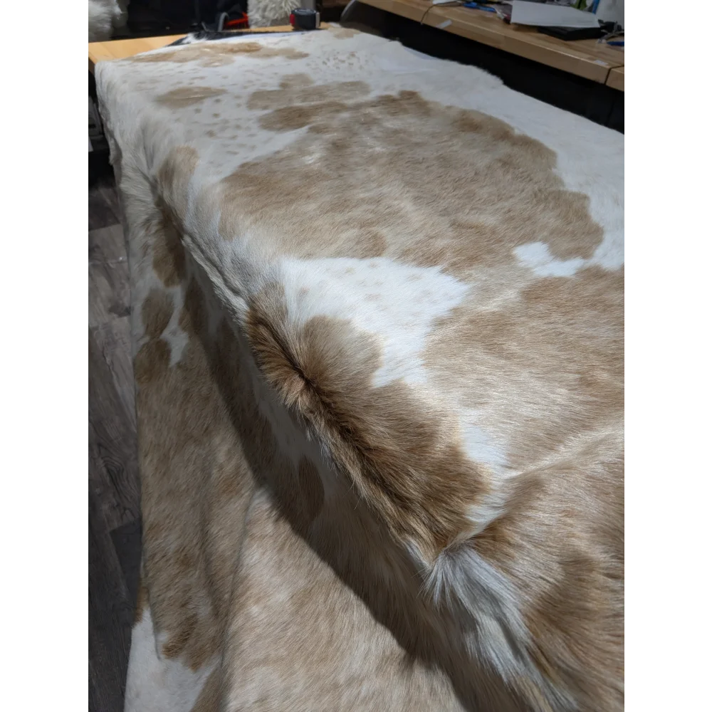 Extra large cowhide rug with tan white patches, soft natural leather texture
