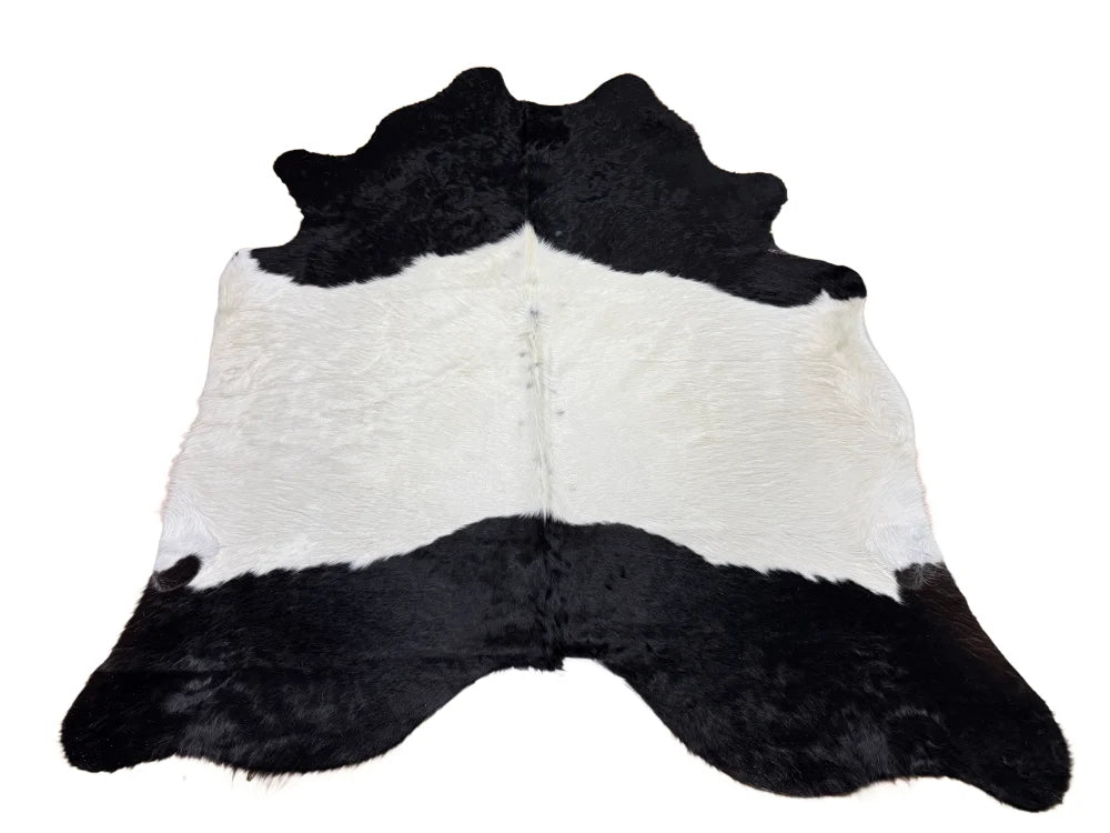 Belted galloway large cowhide rug with black and white natural fur texture showcasing unique characteristics and rustic charm