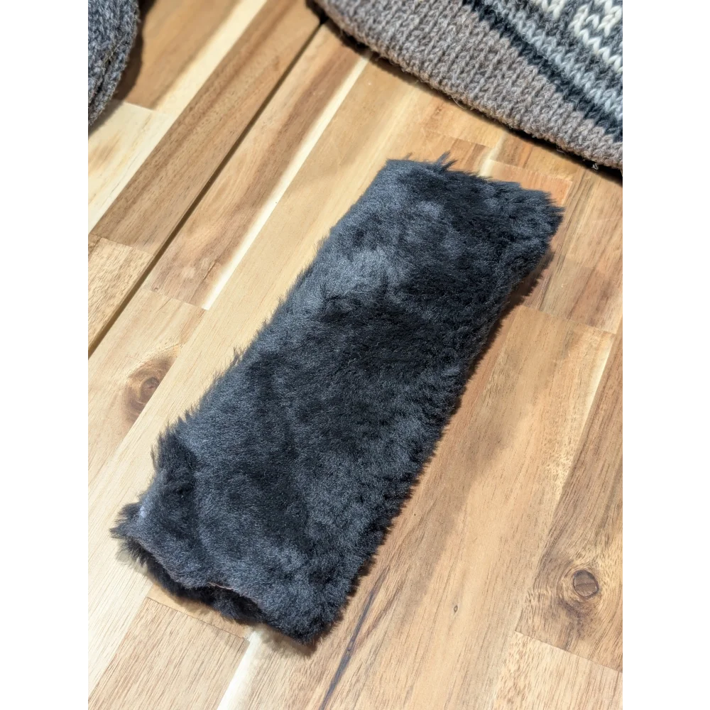 Charcoal gray faux fur headband on Angus Oliver sheepskin seat belt cover