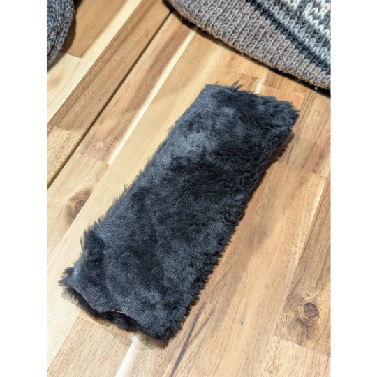 Charcoal gray faux fur headband on Angus Oliver sheepskin seat belt cover