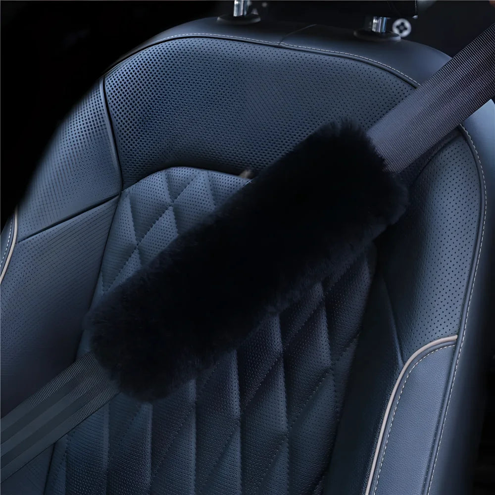 Black sheepskin seat belt cover with quilted leather texture by Angus Oliver