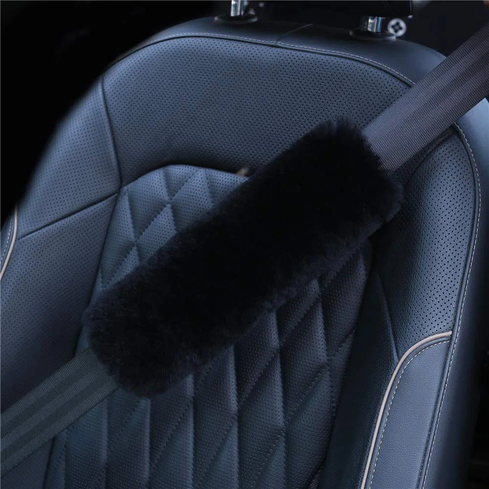 Black sheepskin seat belt cover with quilted leather texture by Angus Oliver