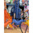 Blue leather dinosaur keychain with orange accents from angus oliver bag charm featuring real cowhide rugs vibe
