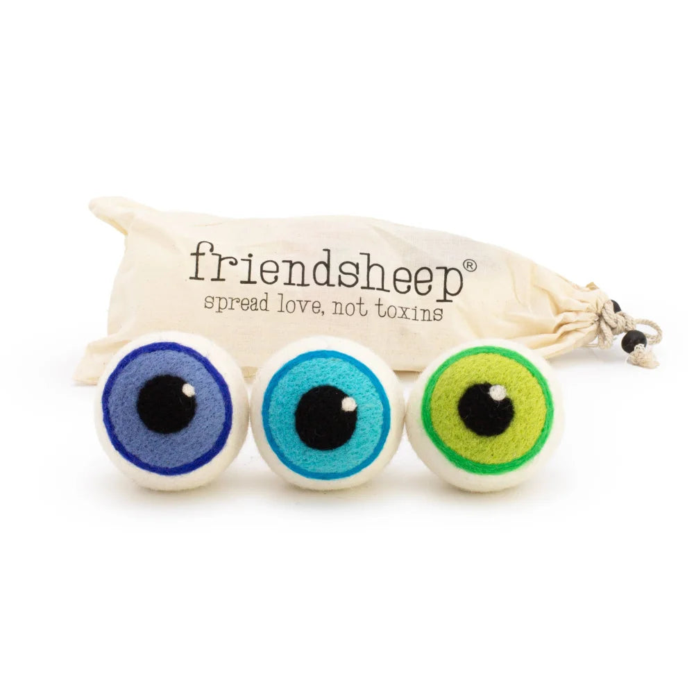 Three felt eerie eyeballs in blue turquoise and green with black pupils and eco dryer bag friendsheep set of 3 dryer balls