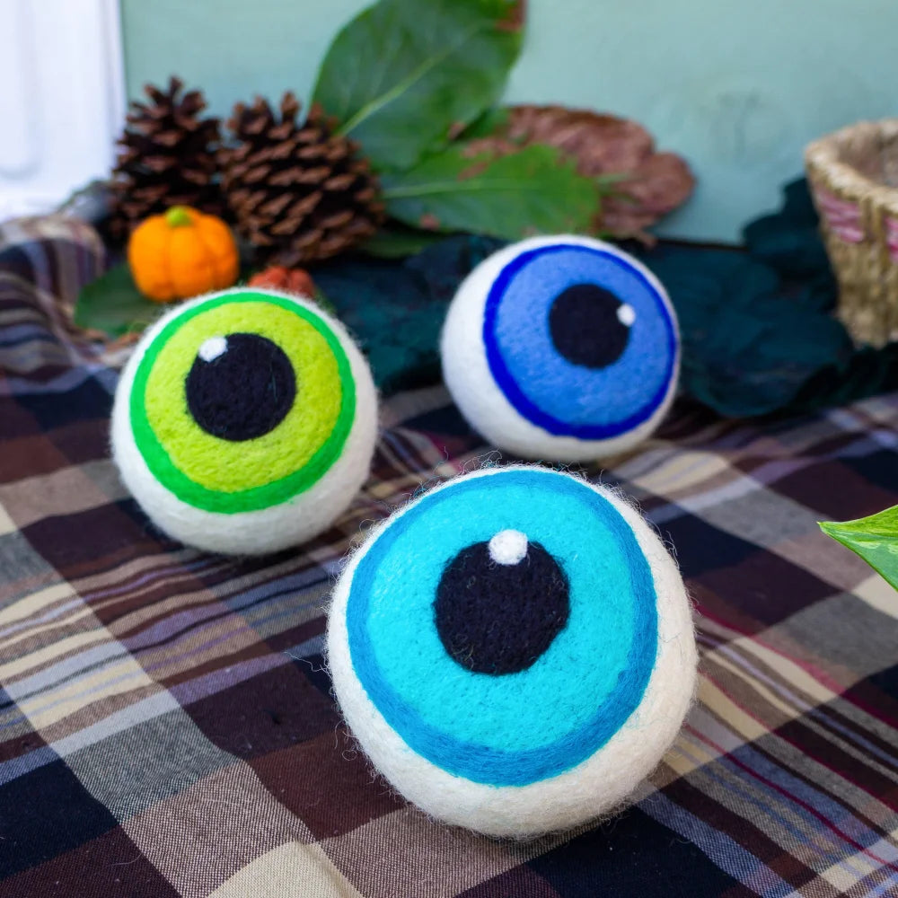 Three hand-felted blue eerie eyeballs dryer balls with vibrant irises and black pupils eco dryer set of 3