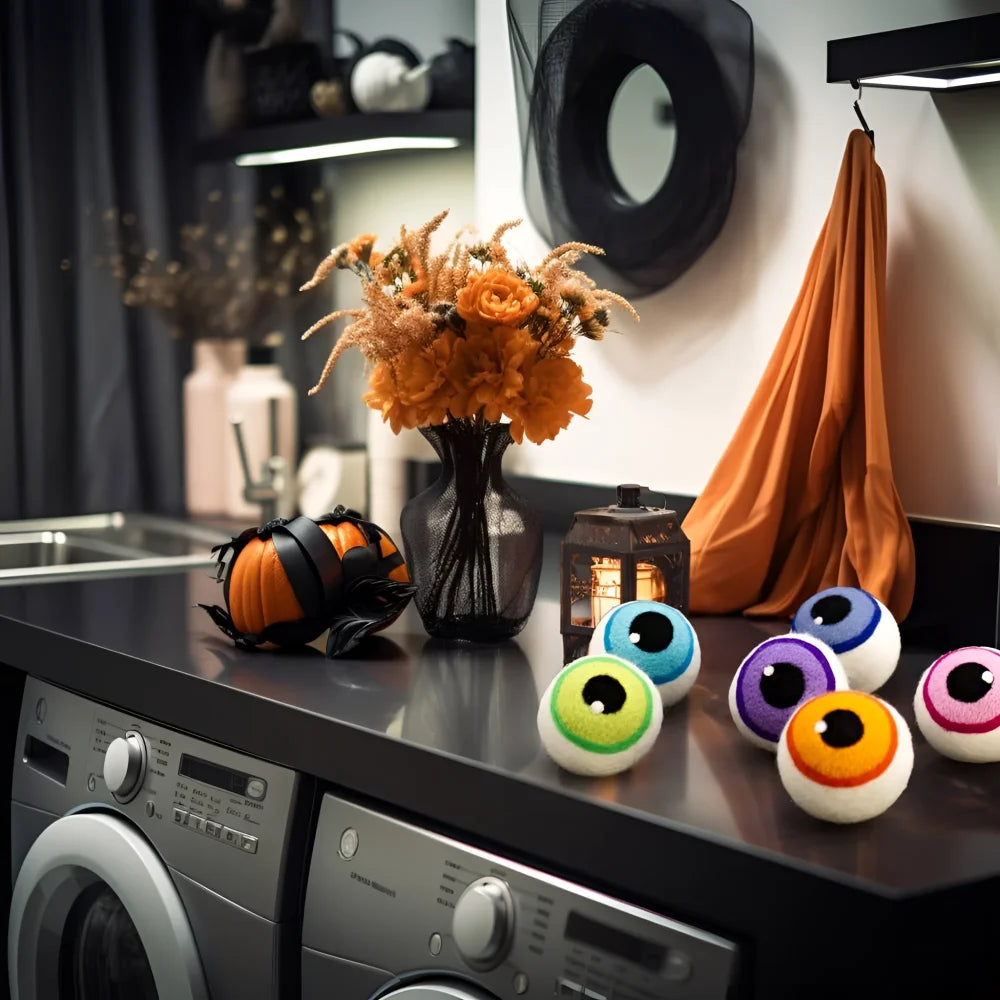 A set of 3 limited edition blue eerie eyeballs eco dryer balls in vibrant colors for an eco-friendly laundry experience