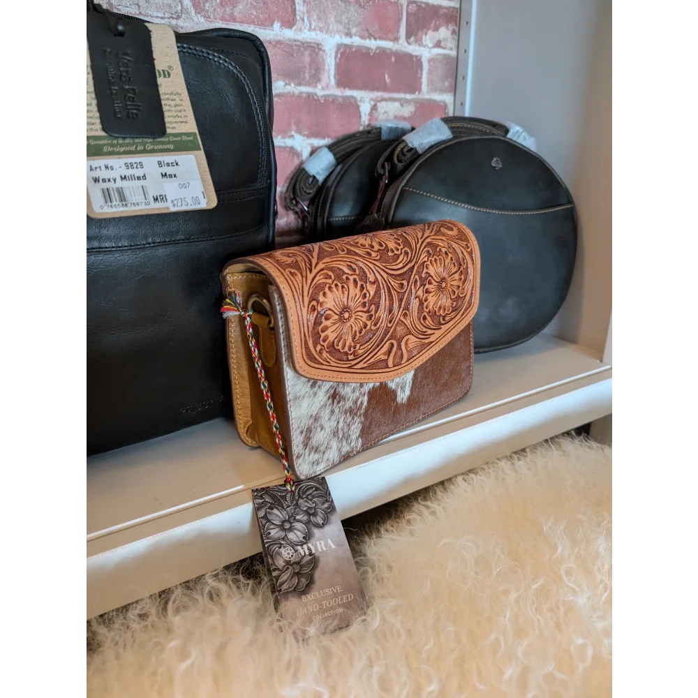 Bridle Blossom handtooled hairon leather purse with floral carvings