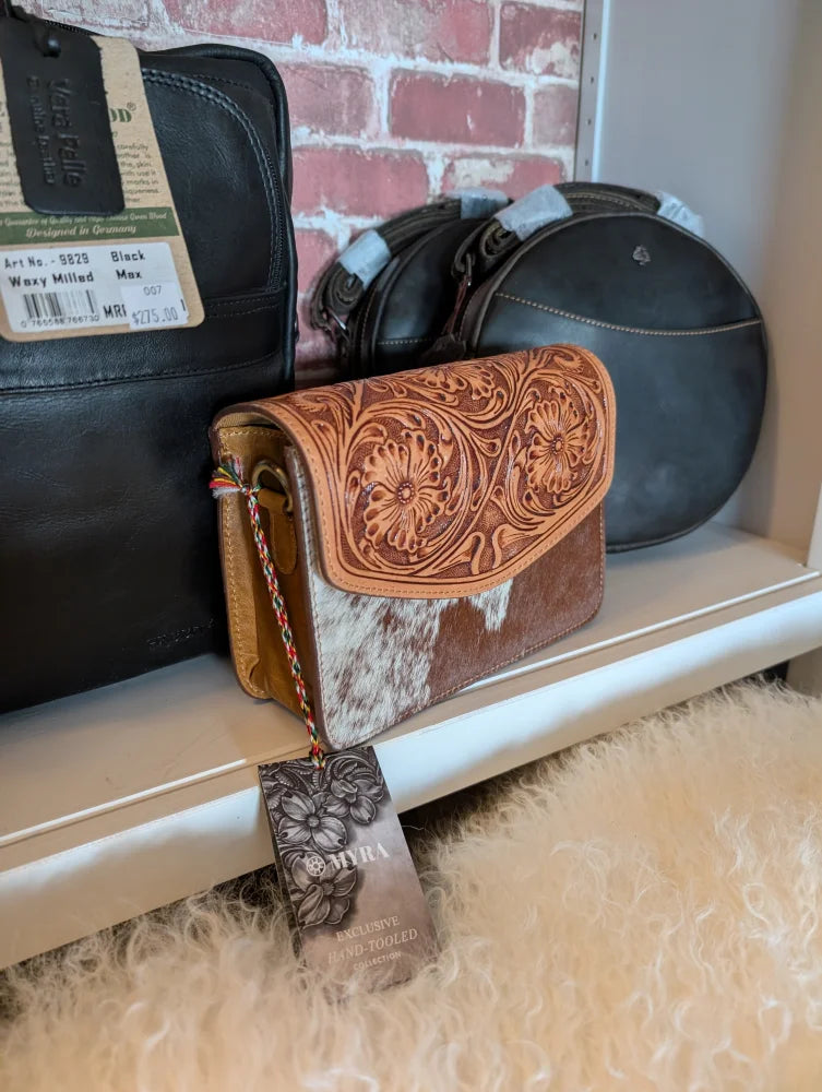Bridle Blossom handtooled hairon leather purse with floral carvings