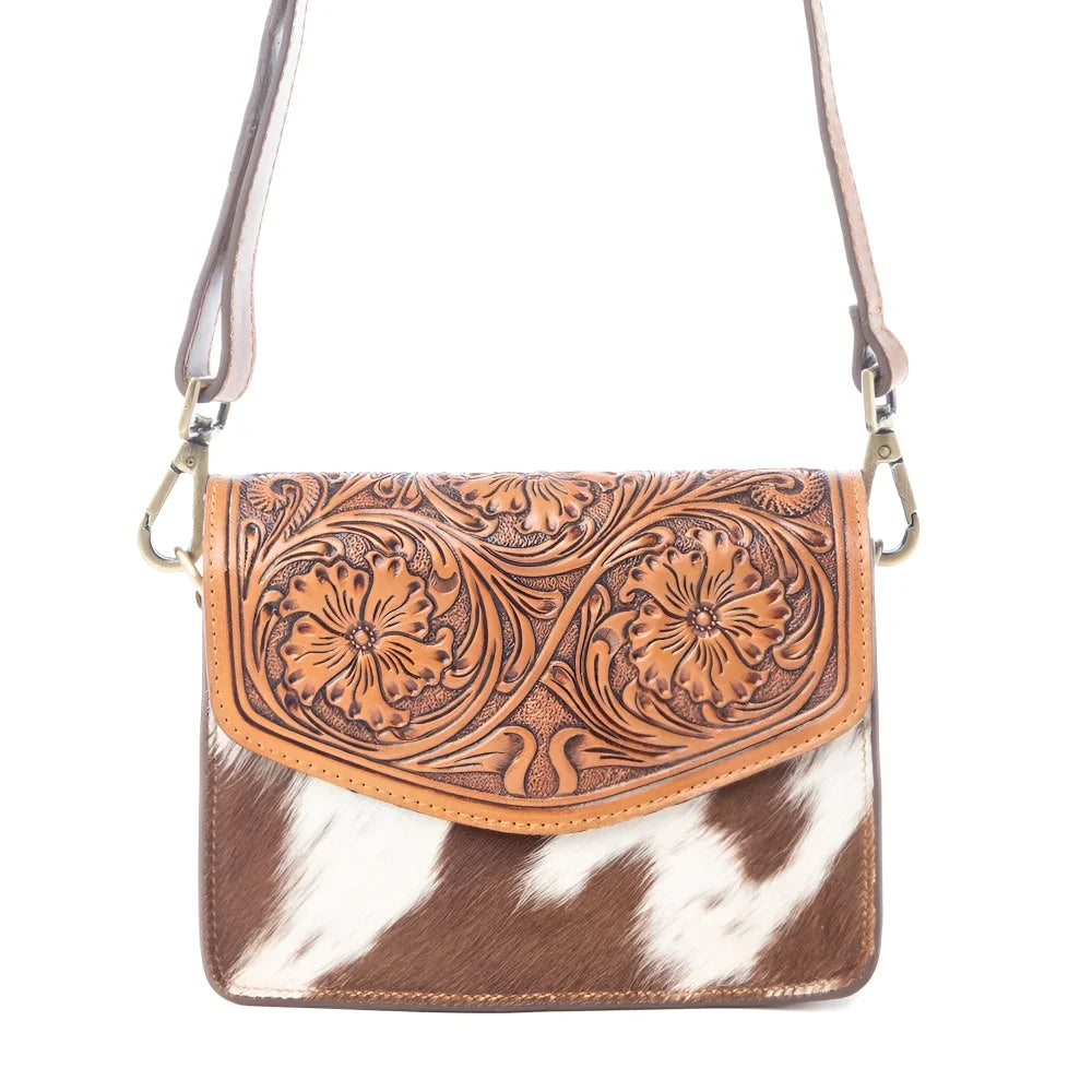 Bridle Blossom handtooled hairon cowhide purse with floral carvings