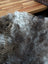 A plush gray british isles sheepskin rug brit13 47 x 31 with soft dense faux fur and natural shade variations