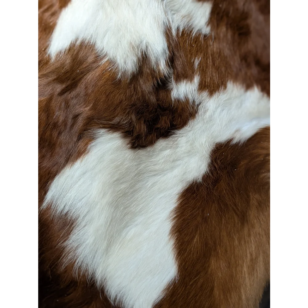 Extra large cowhide rug with brown and white patches, natural leather texture