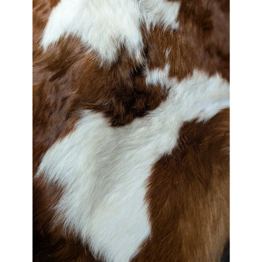 Extra large cowhide rug with brown and white patches, natural leather texture