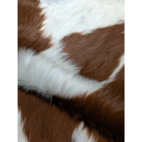 Extra large cowhide rug with brown white patches, soft texture