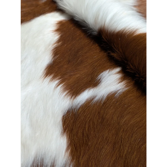 Extra large cowhide rug with brown and white patches, 94x90 inches