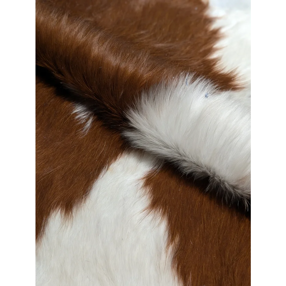 Extra large cowhide blanket in brown and white with fringed edges, 94x90 inches