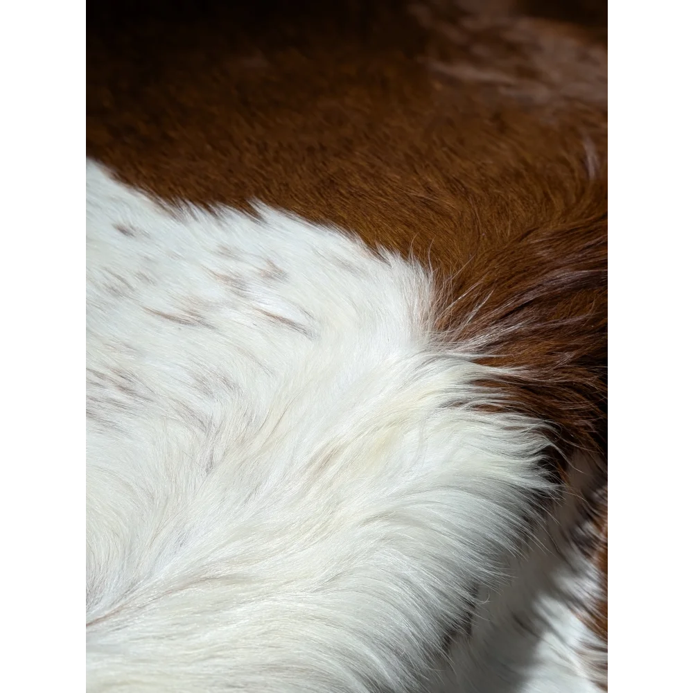 Stylish white and brown extra large cowhide rug with textured fur pattern