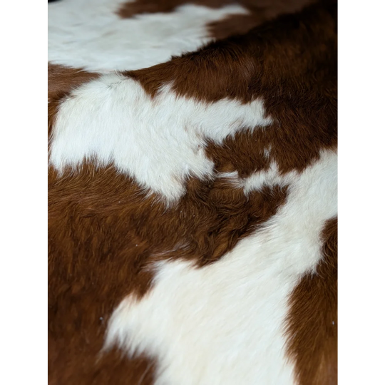 Extra large cowhide rug with brown white patches, soft texture