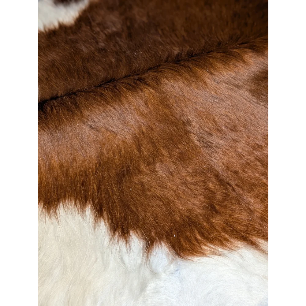 Extra large cowhide rug in brown and white, natural texture, 94x90 inches