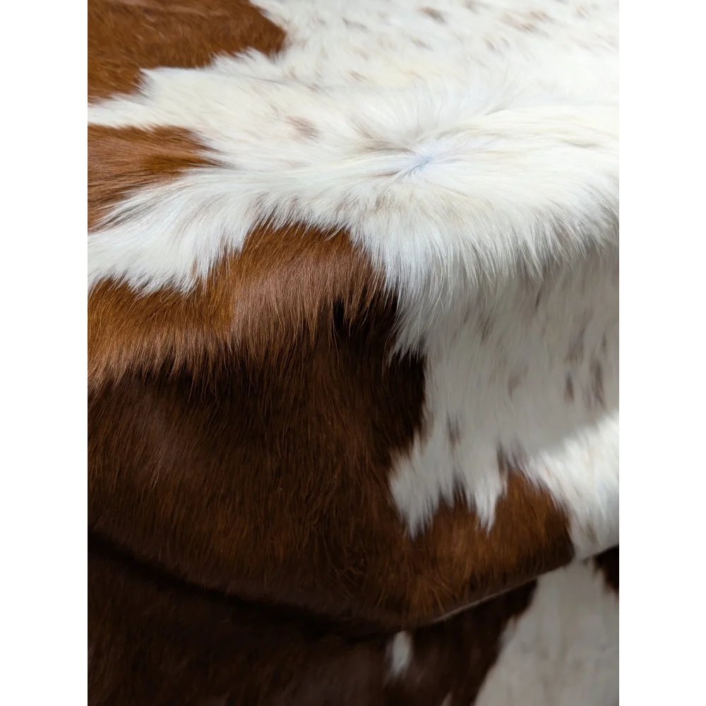 Extra large cowhide rug with brown and white patches, soft texture