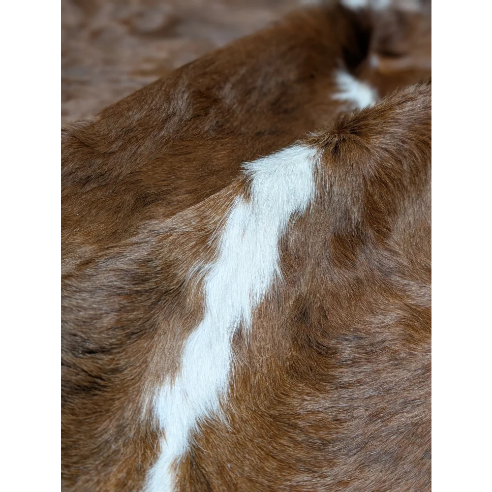 Gorgeous extra large cowhide rug with brown white horse coat stripe