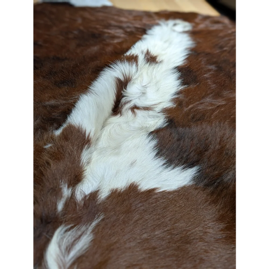 Gorgeous extra large cowhide rug pillow in brown white fur, soft underfoot
