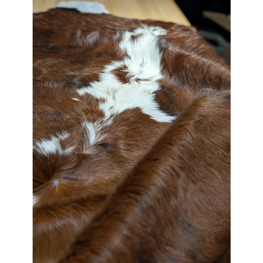 Gorgeous extra large cowhide rug with brown white patches, soft underfoot