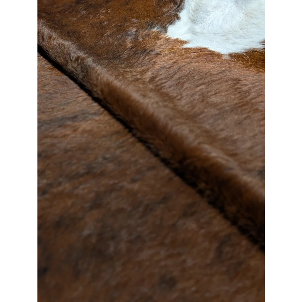 Gorgeous extra large cowhide rug, brown faux fur with white accents