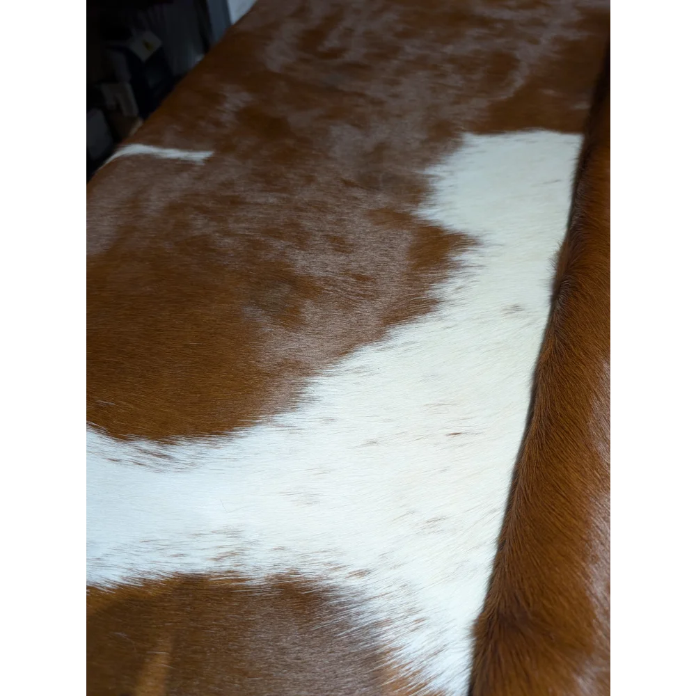 Extra large cowhide rug with brown and white patches, soft underfoot aura