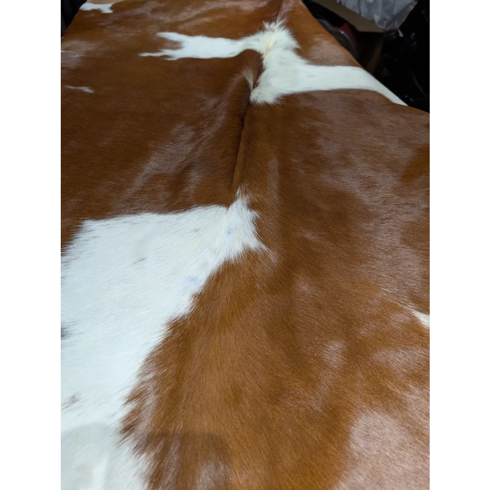 Extra large cowhide rug with brown and white patches, soft underfoot