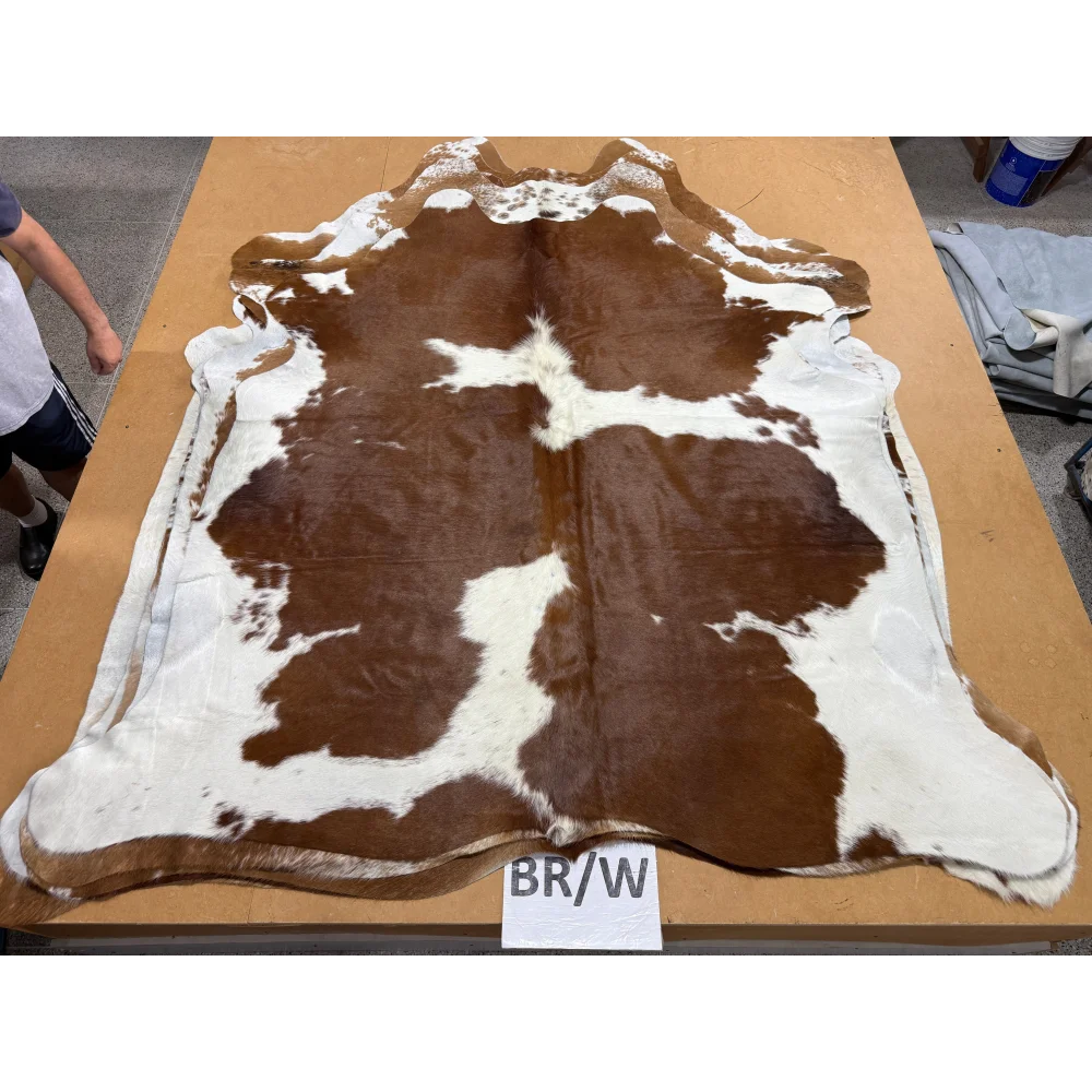 Large BRNWHT141 cowhide rug with brown white patches, soft underfoot aura
